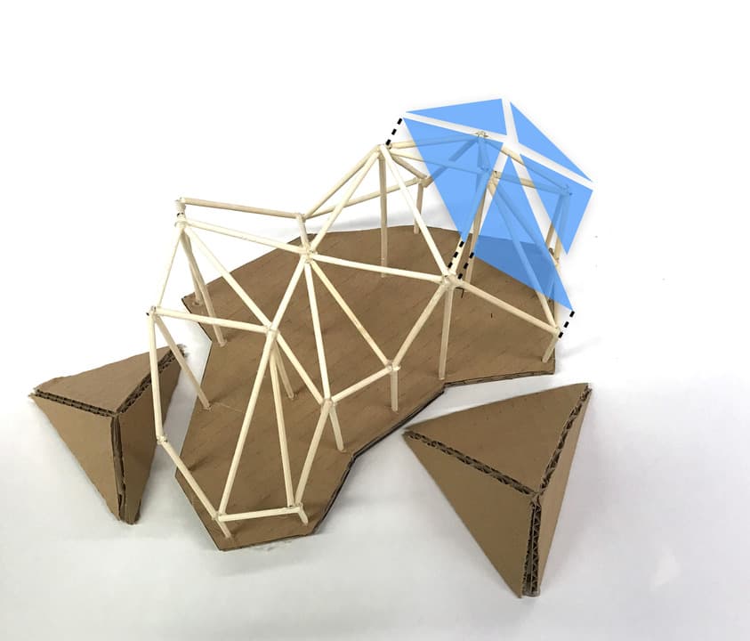 Wooden dowel and cardboard prototype of a faceted reef canopy